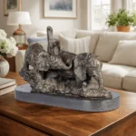 Playful Elephants on Pedestal